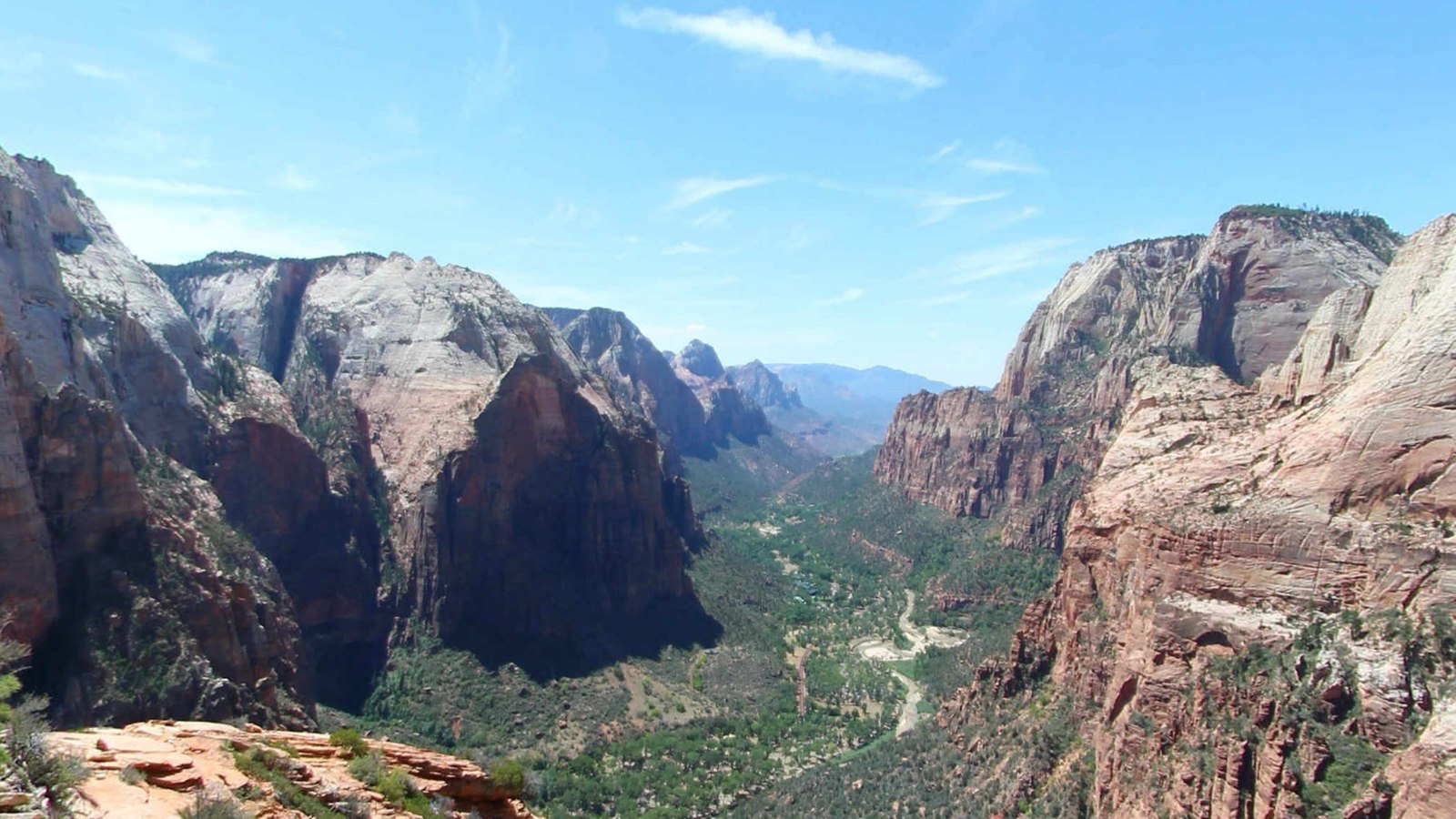 High canyon panorama: Layered rock and distant canyon scenery.